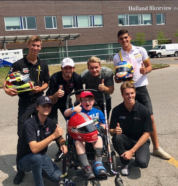 Six Mazda Road To Indy Drivers Delight Kids at Toronto Hospital ...